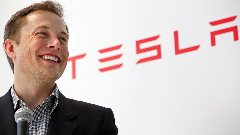 Elon Musk says Apple is trying very hard to recruit from Tesla