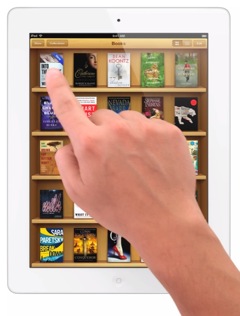 iBookstore on white iPad (hand operating, small)