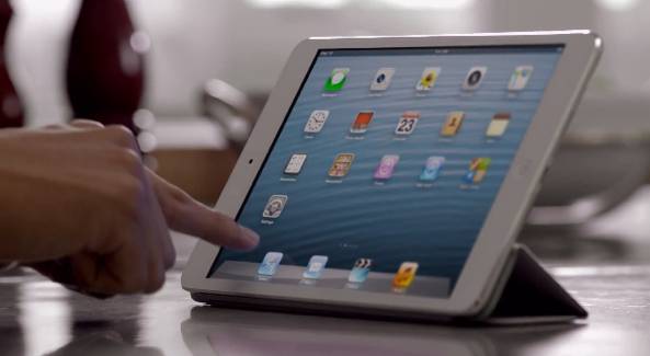 iPad mini promo (Smart Cover, launching Safari)