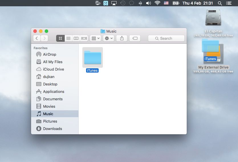 Drag iTunes folder from your Mac to the external drive