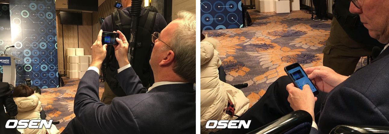 Eric Schmidt taking photos with iPhone 6s in South Korea
