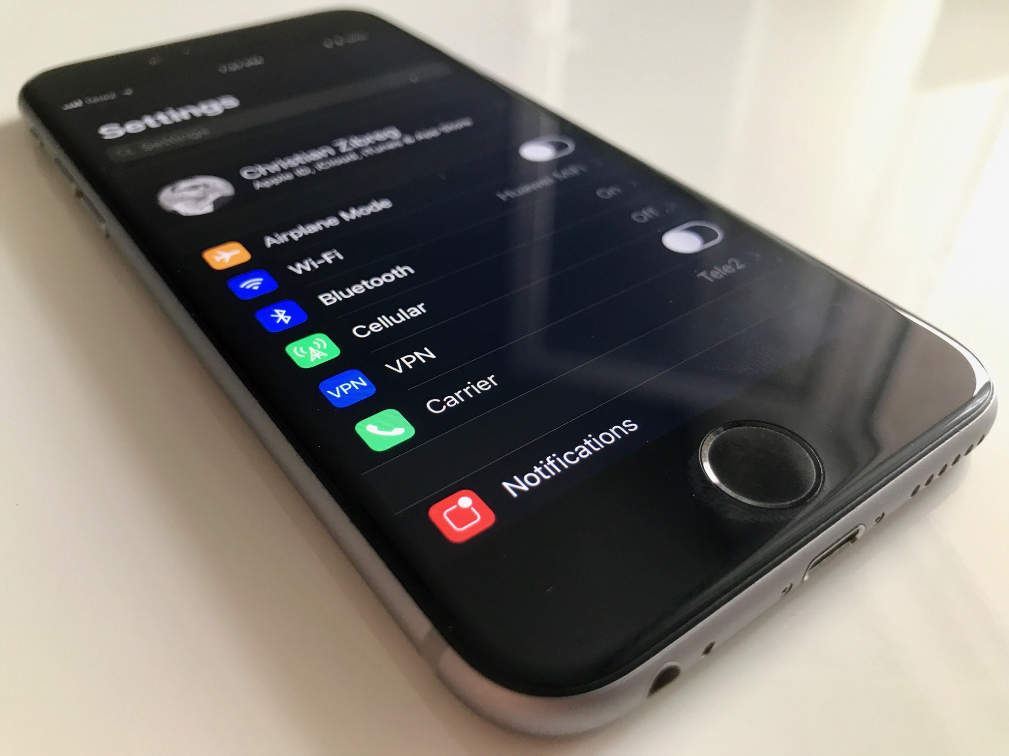 iOS 11's Settings app with simulated dark mode via the Smart Invert option