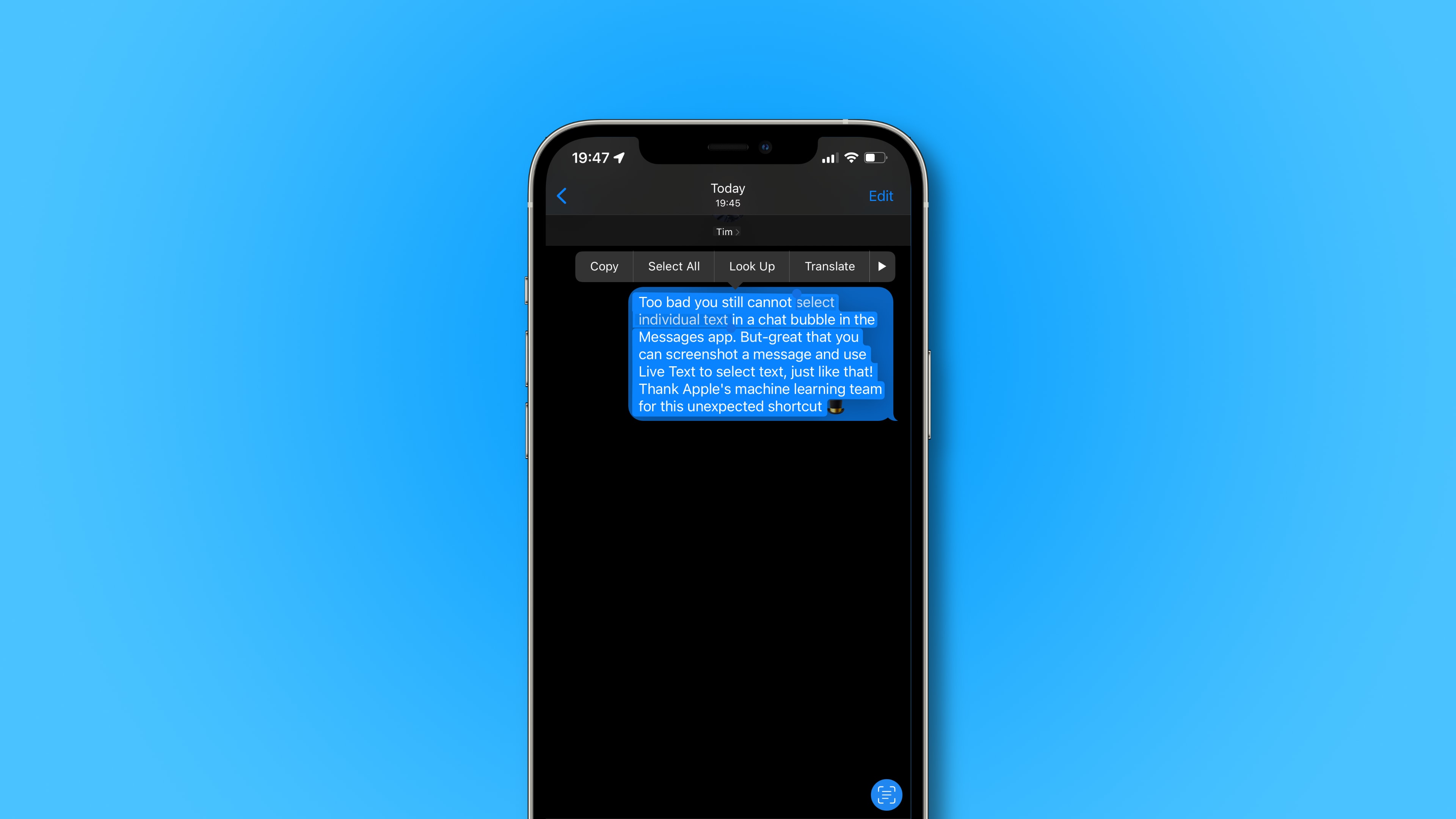An iPhone showing a screenshot of a Messages chat bubble with Live Text used to copy a custom part of the message