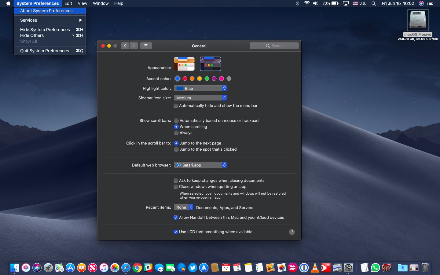 macOS Mojave Dark Mode with the blue accent and highlight color