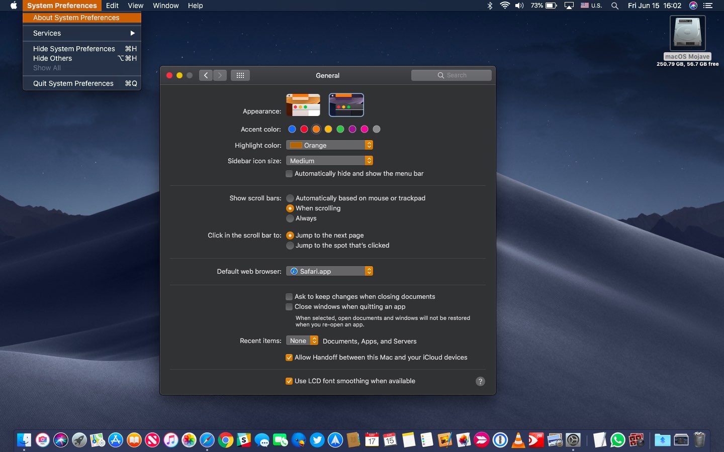 macOS Mojave Dark Mode with the orange accent and highlight color