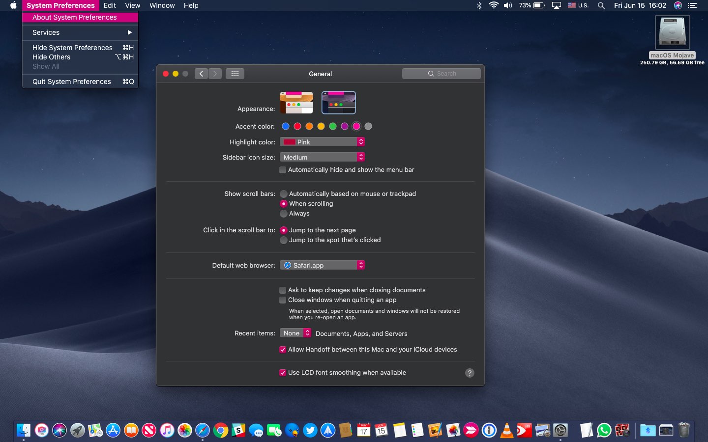 macOS Mojave Dark Mode with the pink accent and highlight color