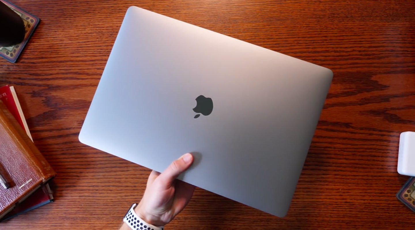 A photograph showing a 15-inch 2018 MacBook Pro model being unboxed by iDownloadBlog's Harris Craycraft