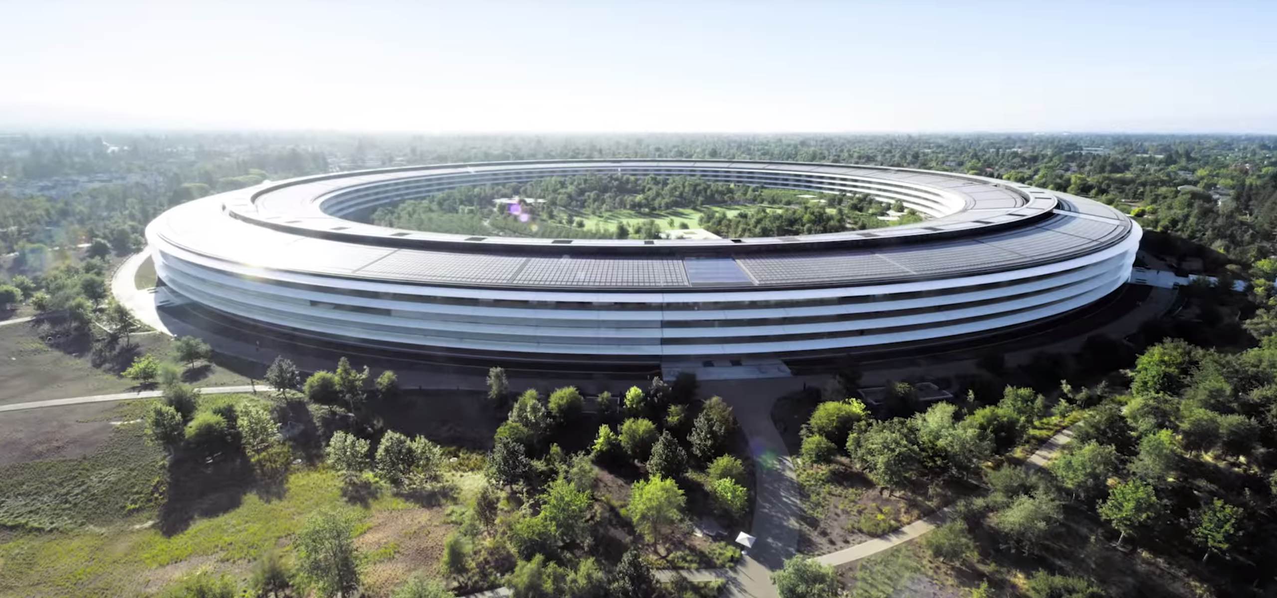 A photograph showing an aerial view oof the Apple Park headquarters