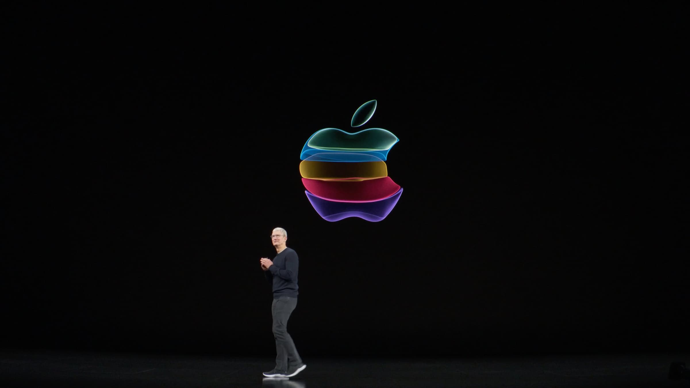 Tim Cook in front of Apple logo at the By Innovation Only event