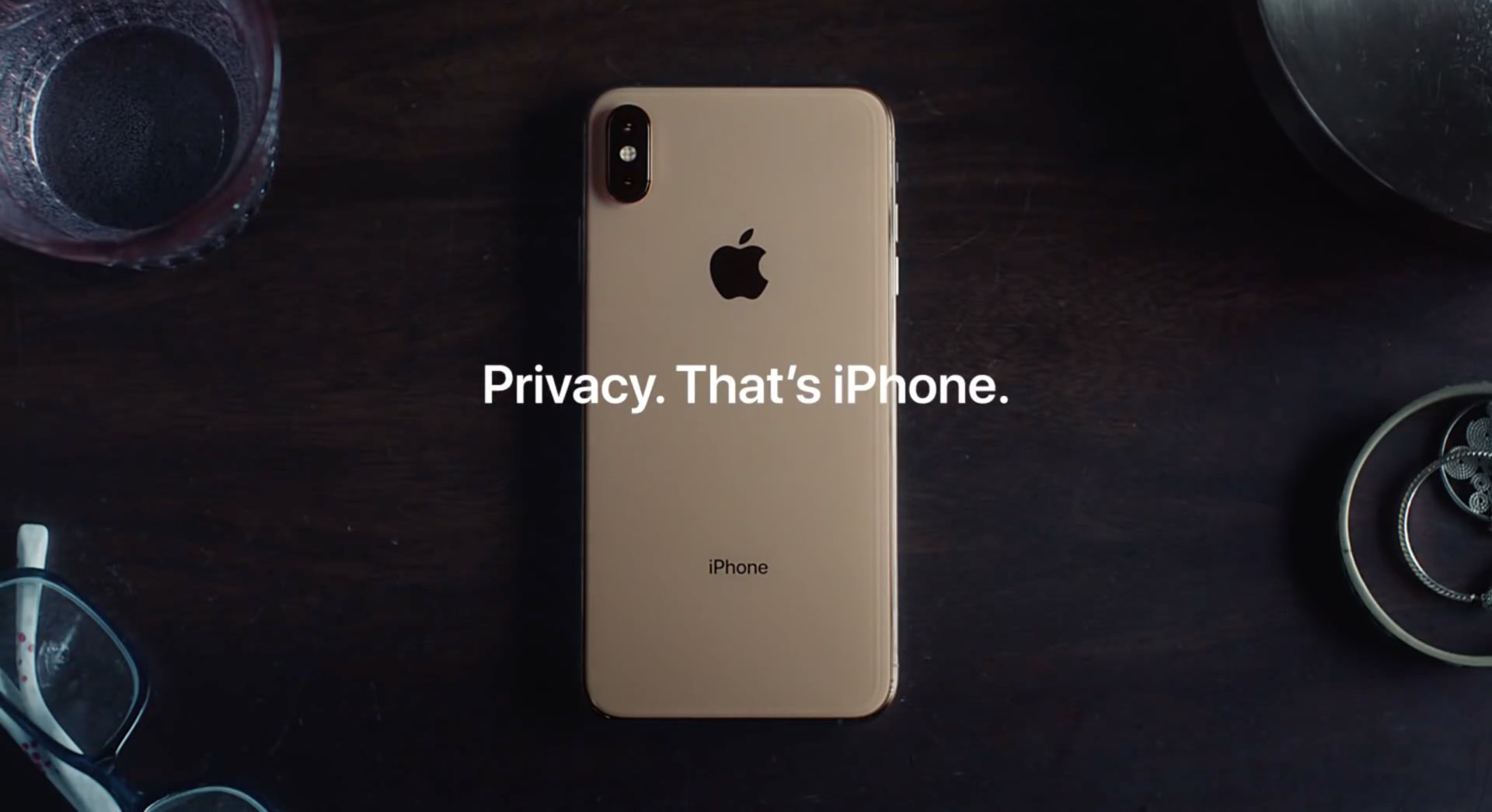 A still from an Apple ad showing the back of an iPhone 12 XS Max with the words "Privacy. That's iPhone" shown 