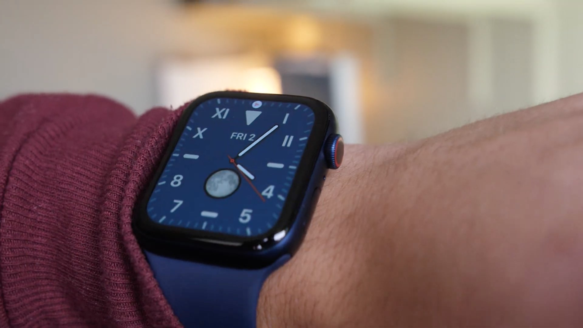 Blue Apple Watch on wrist