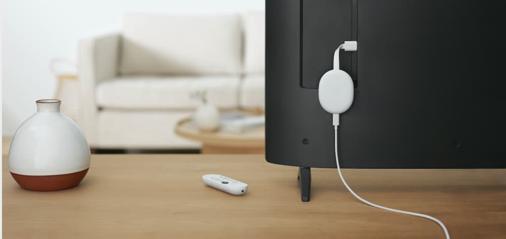 A press image from Google showing the new Chromecast dongle with built-in Android TV connected to a TV set