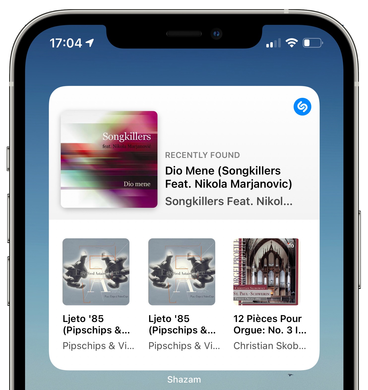 An iPhone screenshot of the Home screen with Shazam's medium-sized widget 