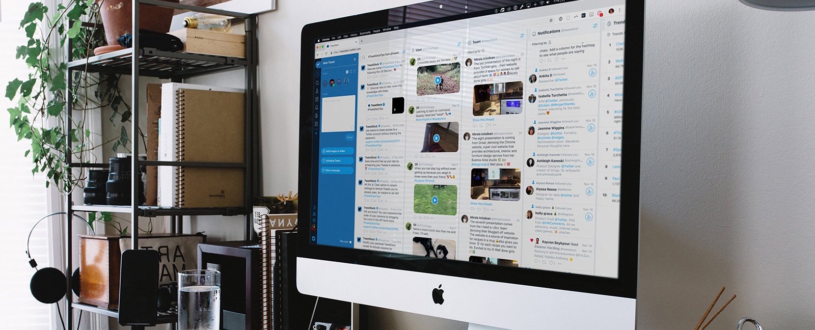 A photograph showing TweetDeck running on an iMac lying on on a work desk