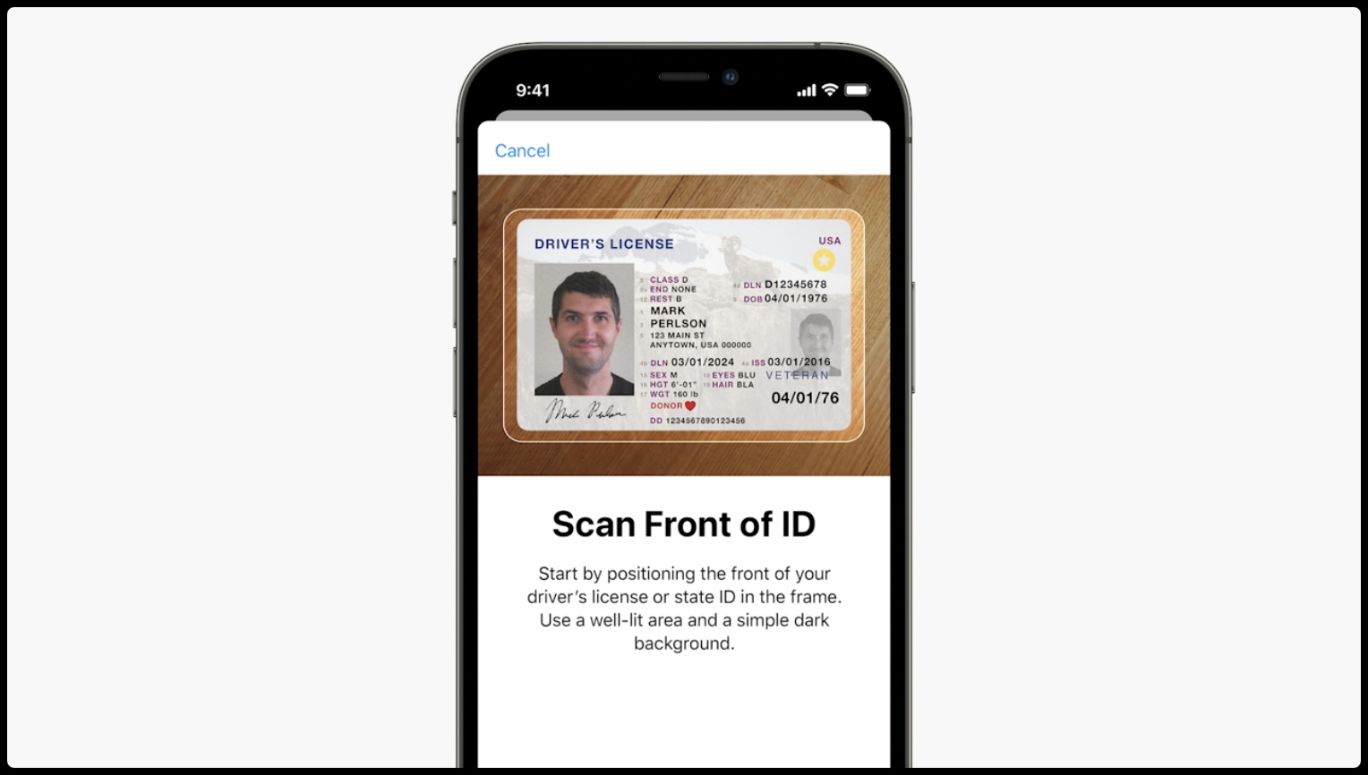 Apple's promotional image for iOS 15 showing an iPhone with a user's driver's license in the Wallet app
