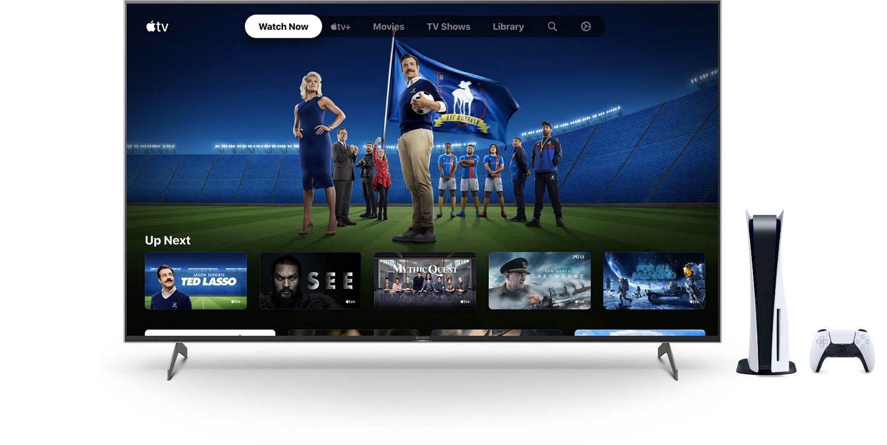 Promotional image showing a large TV set with the Applet TV app on the Ted Lasso page and a Sony PlayStation 5 console next to it