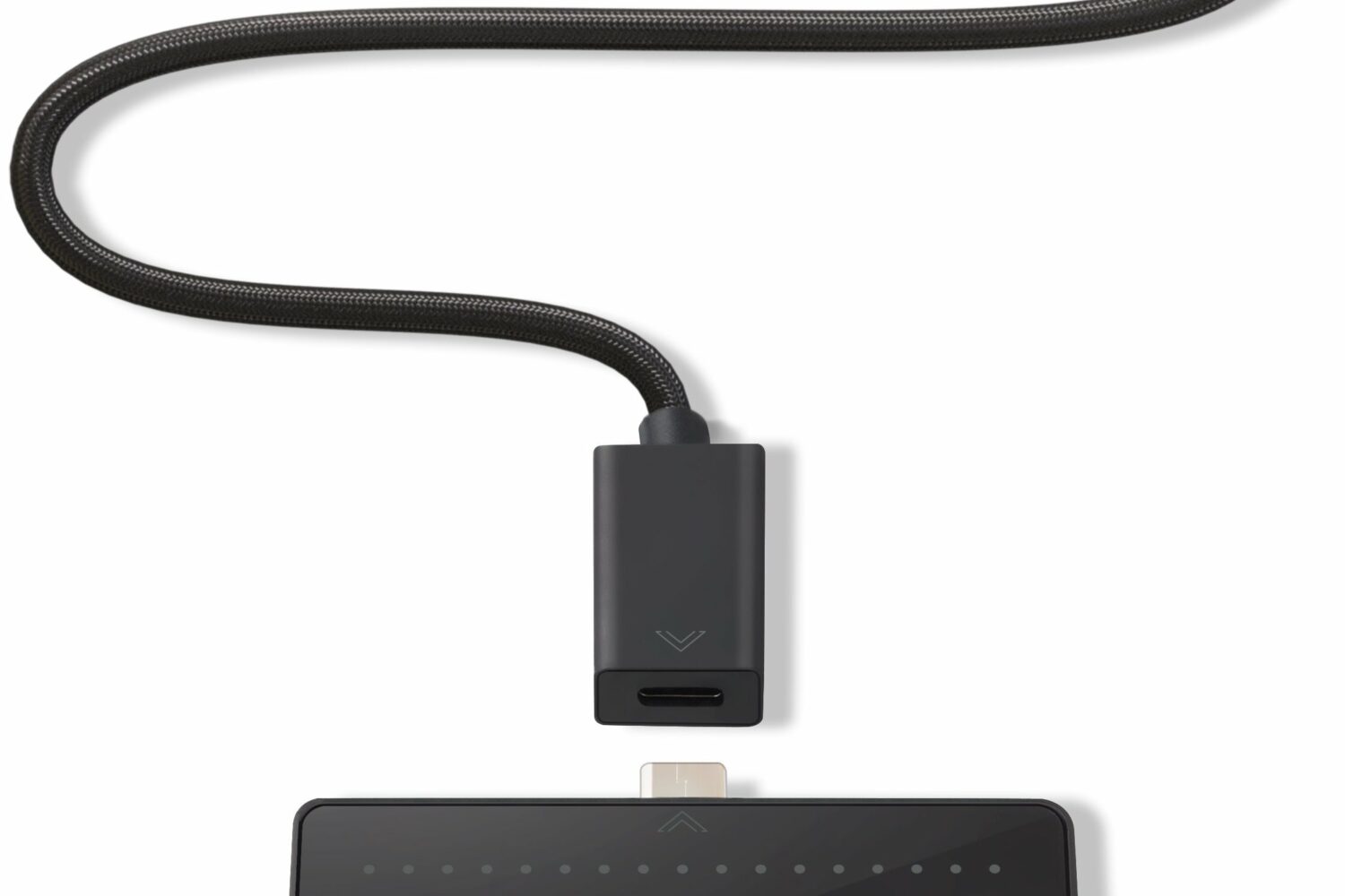 A promotional image from Twelve South showing a top-down view of its StayGo Mini USB-C hub with the included cable