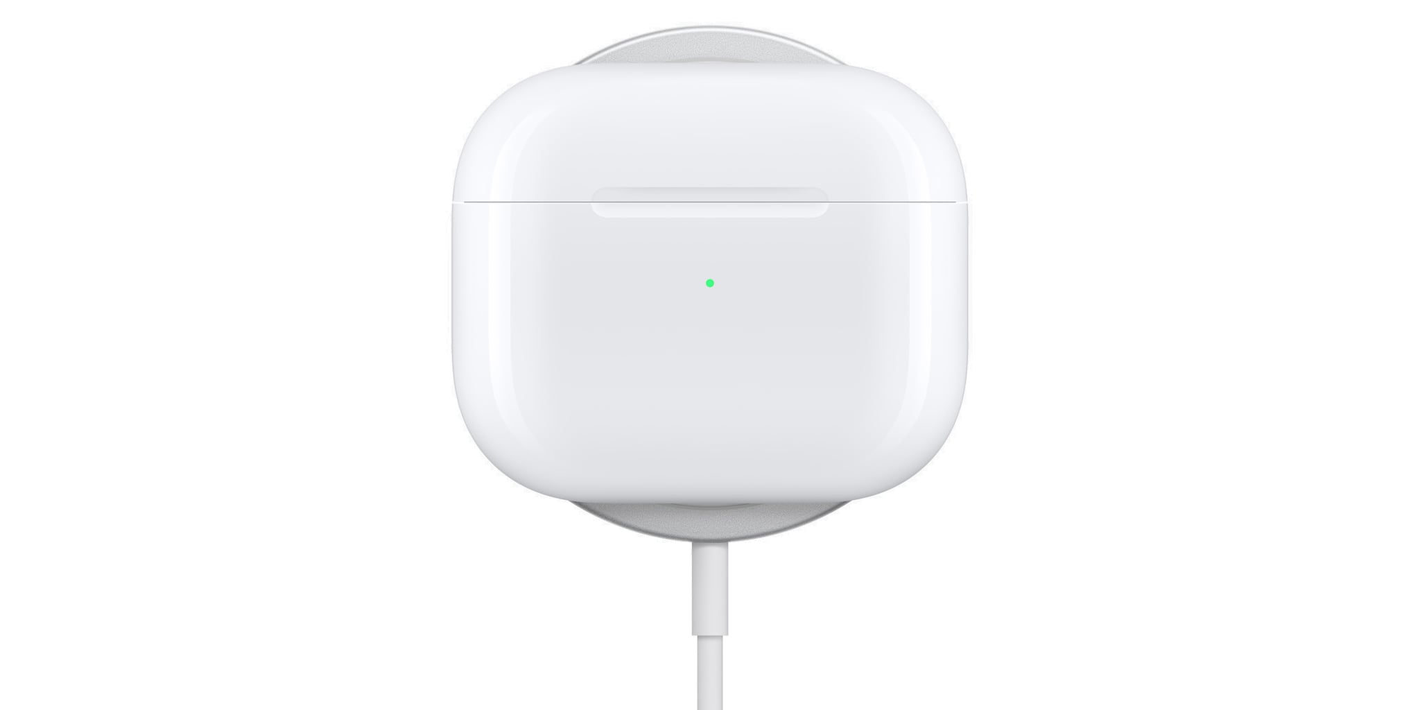 Apple's marketing image showing the AirPods 3 charging case sitting on a MagSafe wireless charging puck
