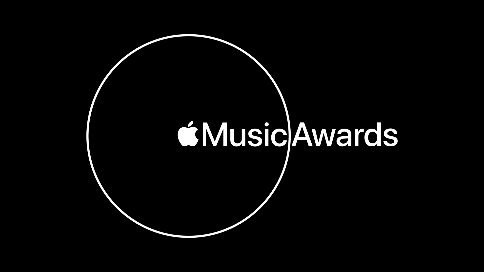 An imag showing a white circle outline wit the words "Apple Music Awards" inside and outside of the circle