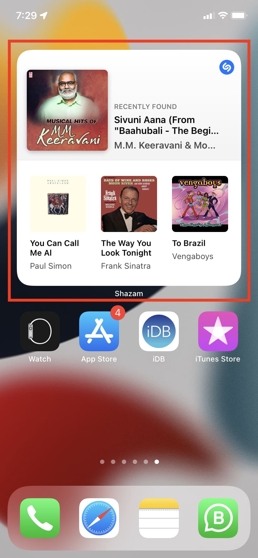 Shazam widget on iPhone Home Screen showing recently identified songs