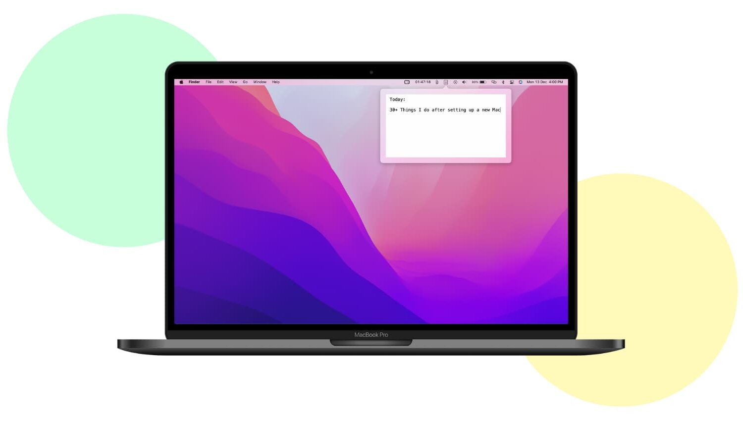 MacBook Pro with macOS Monterey wallpaper on a light background