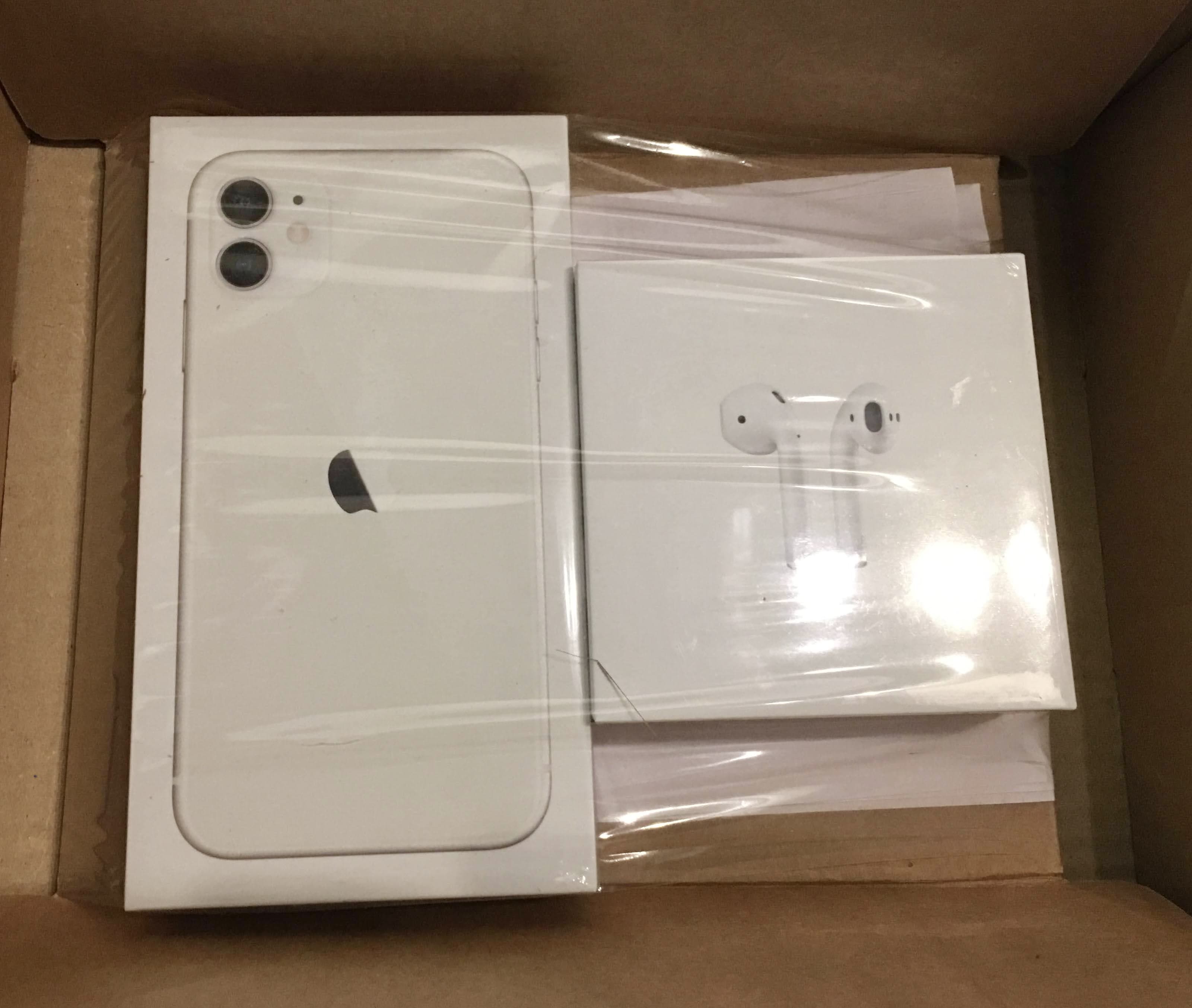 iPhone and AirPods packed in original box