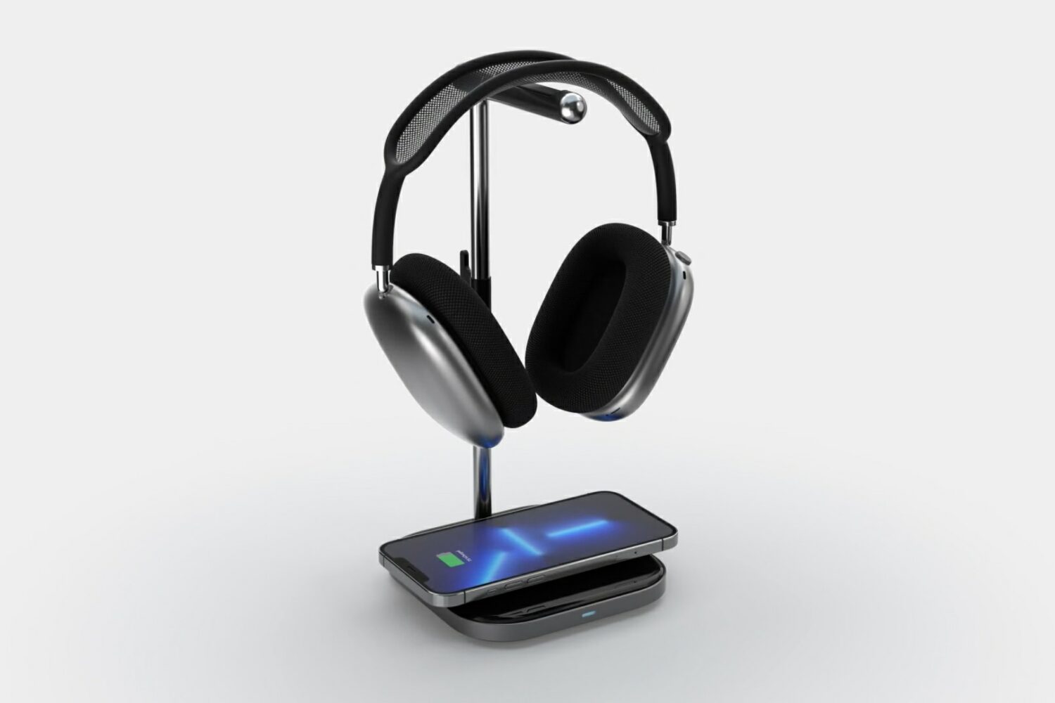 A still image from Satechi's promotional video showing its 2-in-1 Headphone Stand with Wireless Charger being used simultaneously with a pair of AirPods Max and iPhone 13
