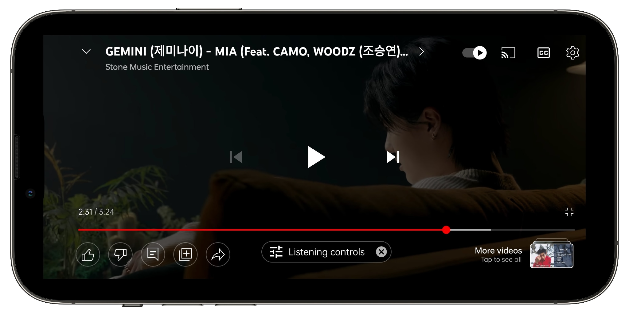 Device screenshot showing the new YouTube fullscreen video player in landscape on iPhone
