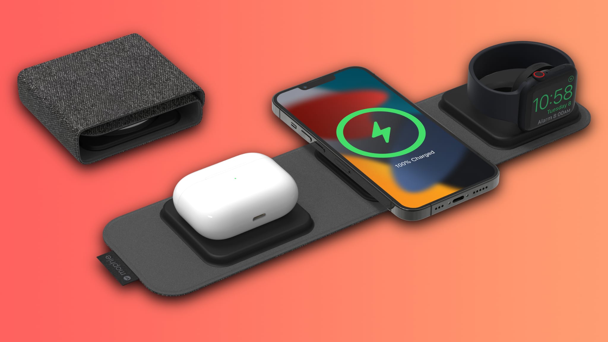 A rendering showing an isometric view of Mophie's 3-in-1 travel charger with AirPods, iPhone and Apple Watch resting on its charging pads, set against a light orange gradient background 