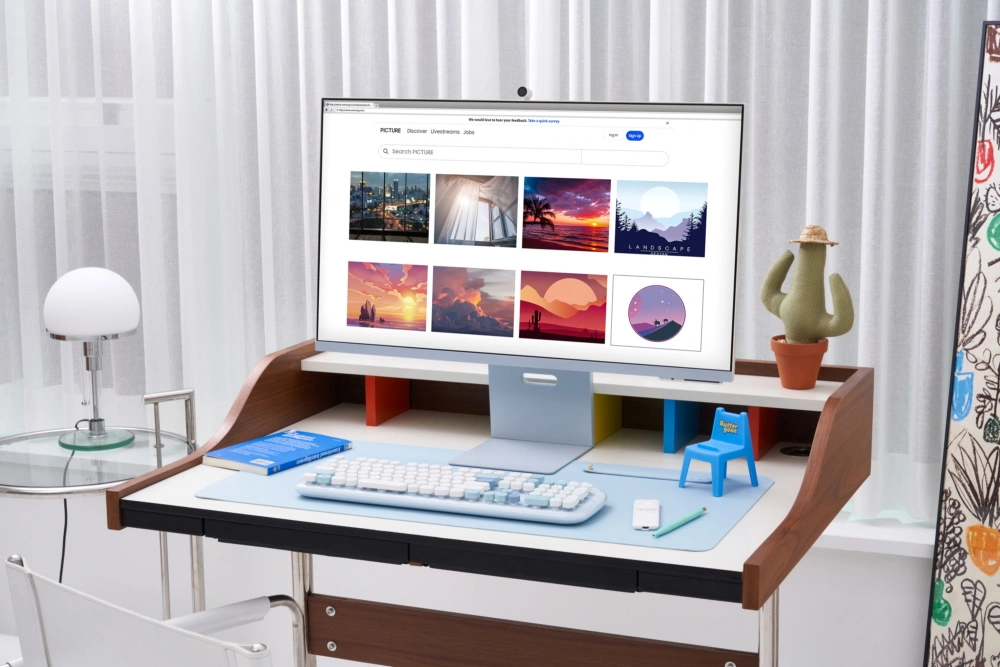 Lifestyle photograph showcasing Samsung's external monitor dubbed Smart Monitor M8 with AirPlay compatibility and Apple's TV app