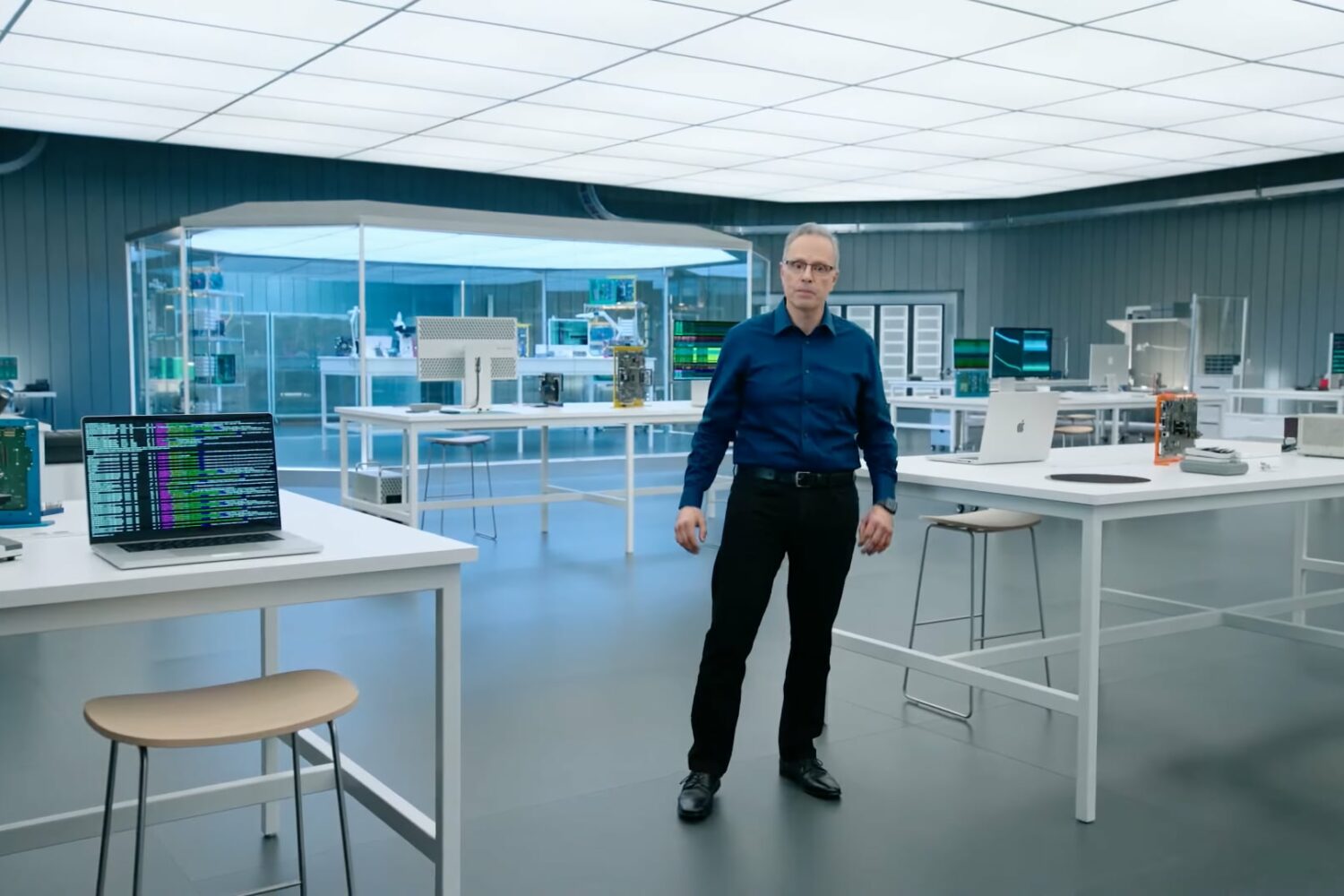 This still taken from the custom chip development segment of the Apple Event March 2022 video depicts Johny Srouji, Senior Vice President of Hardware Technologies, standing in his office at the Apple Park headquarters
