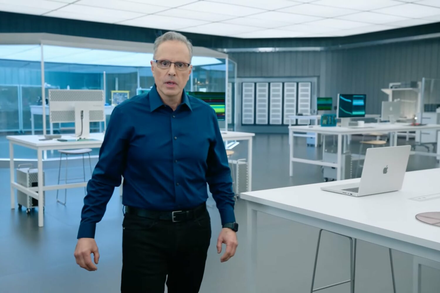 This still taken from the custom chip development segment of the Apple Event March 2022 video depicts Johny Srouji, Senior Vice President of Hardware Technologies, walking in his office at the Apple Park headquarters
