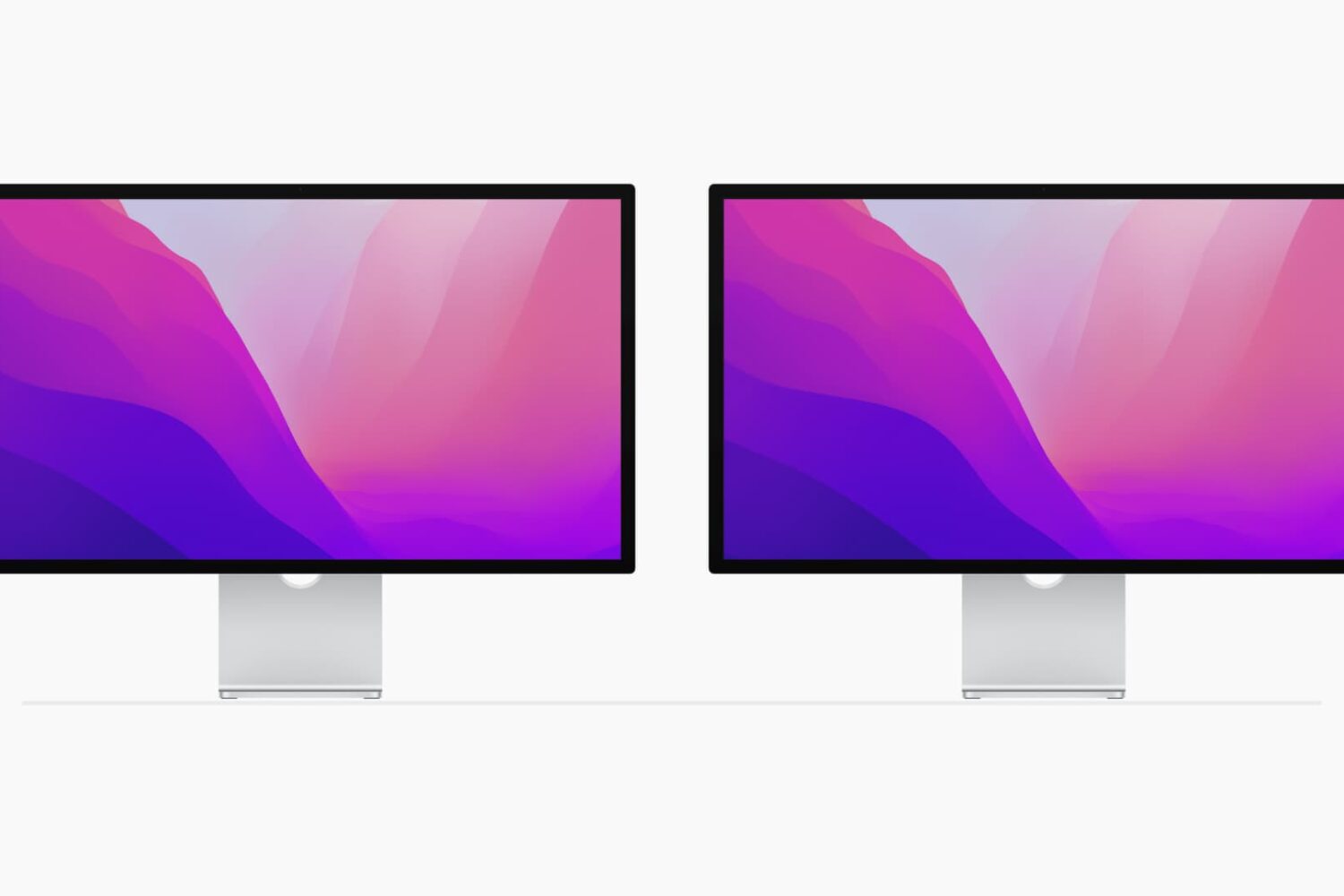Two Mac displays placed side by side