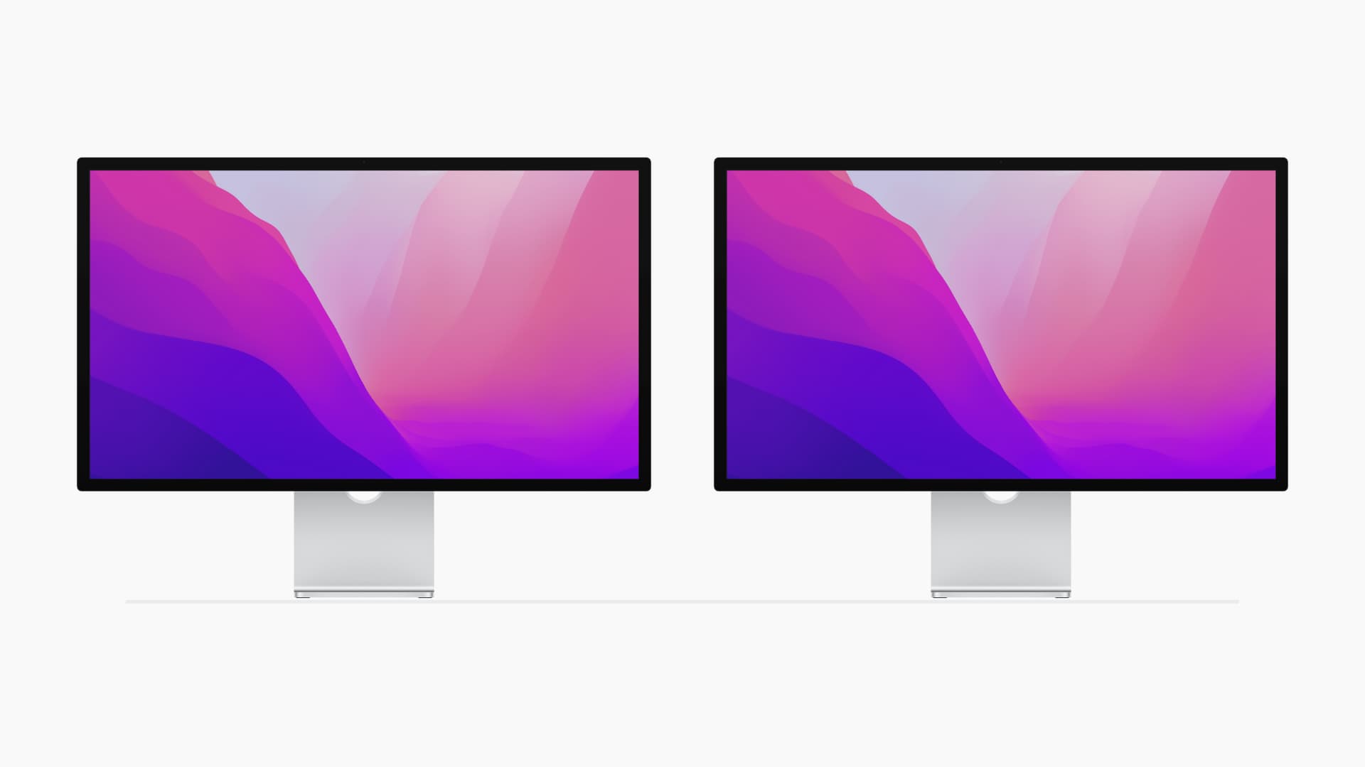 Two Mac displays placed side by side