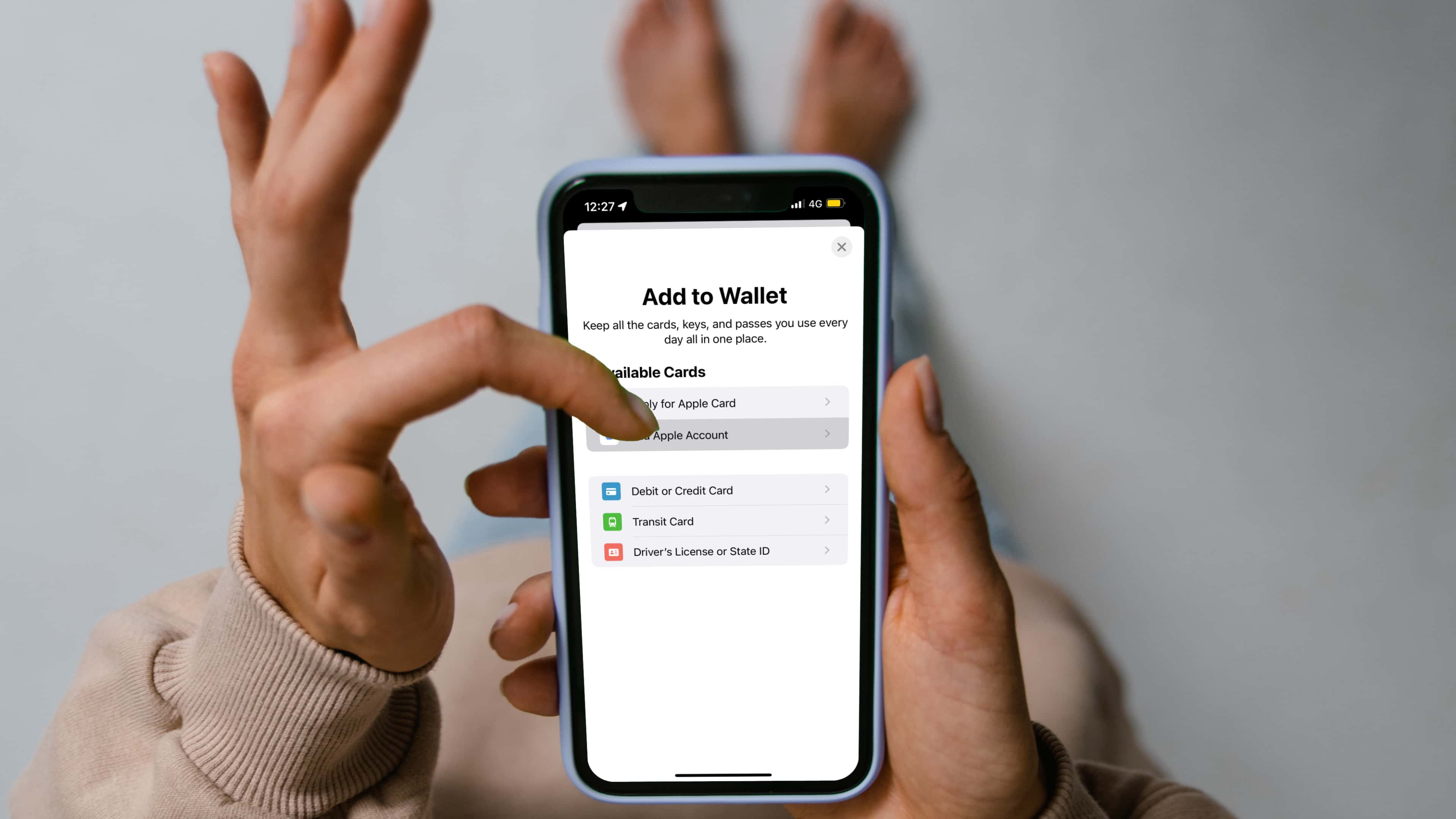 This mockup illustrates adding an Apple Account card to the iPhone's Wallet app on iOS 15.5 and later