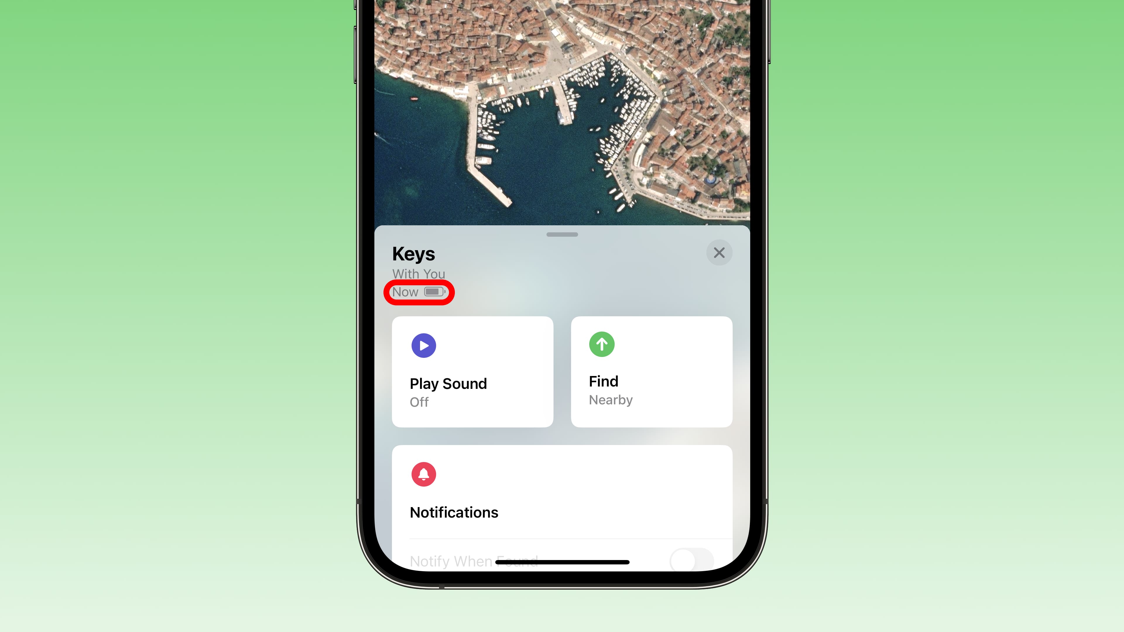 Apple's Find My app is shown on this featured image, with the current battery level of the selected AirTag shown annotated on the iPhone screenshot