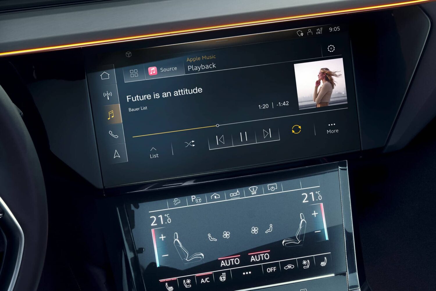 Apple Music's native integration in Audi's 2022 models is showcased in this press photo, with the Now Playing interface displayed on a car's Multi-Media Interface screen