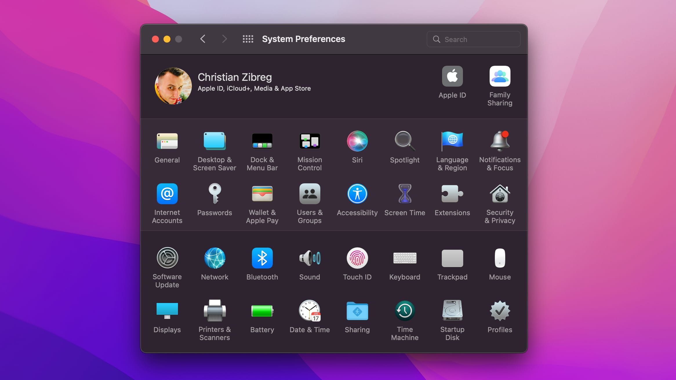 The interface of Apple's System Preferences app is showcased in Dark Mode in this macOS Big Sur screenshot