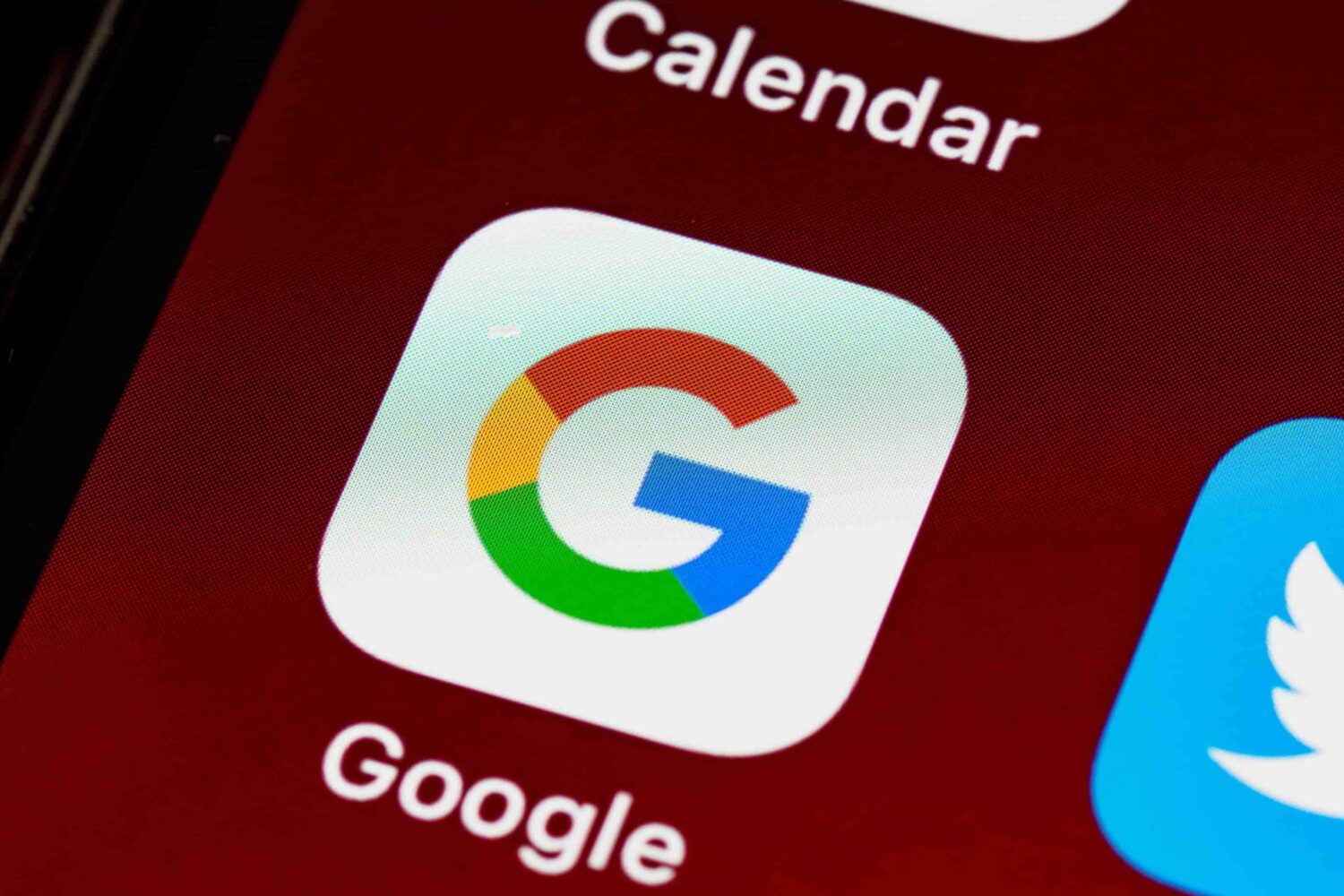 This image from Unsplash shows a closeup of the Google app icon on an iPhone home screen