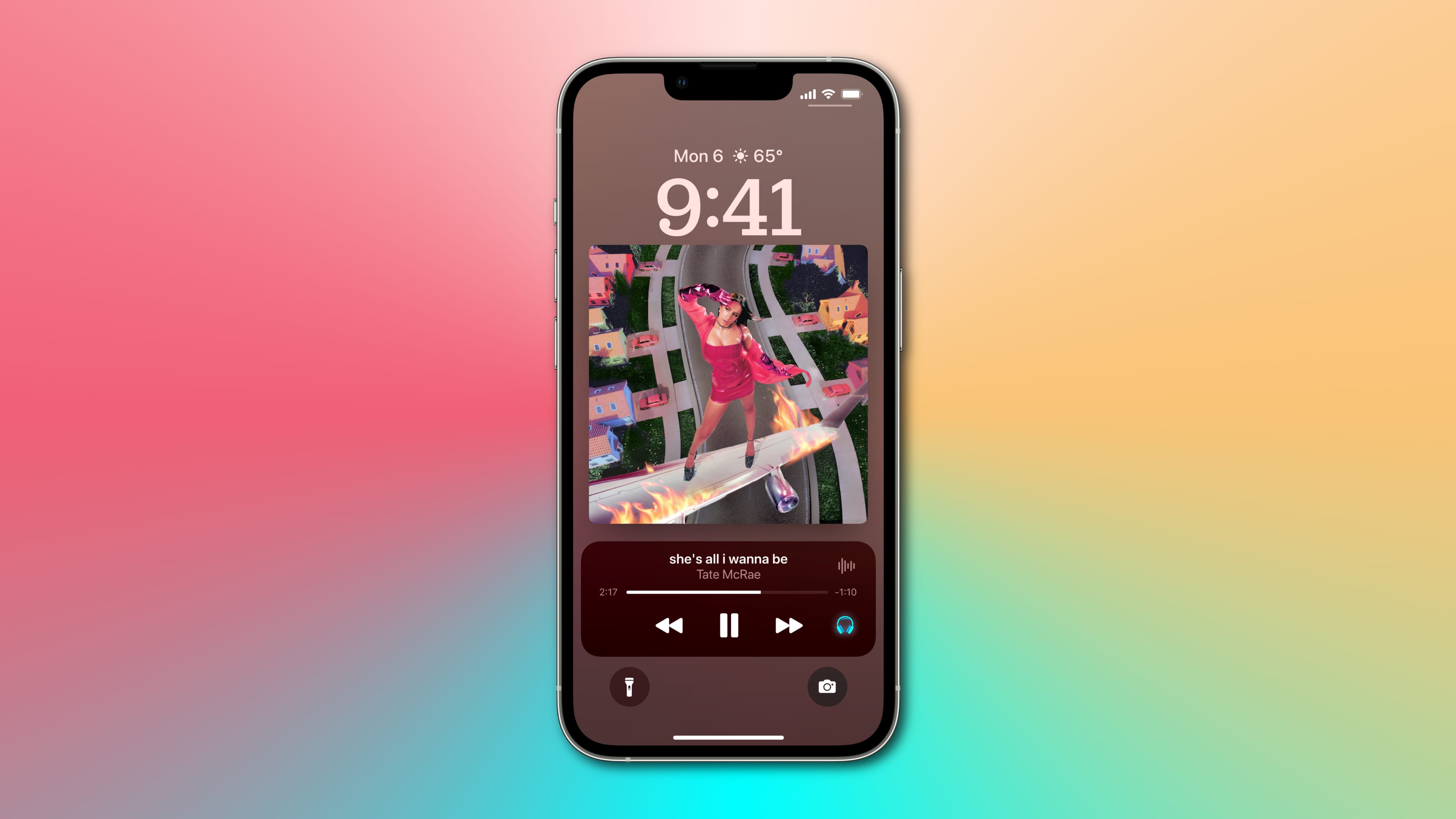 iPhone screenshot showcasing expanding the Now Playing control to a fullscreen view on the lock screen thanks to the Live Activities feature