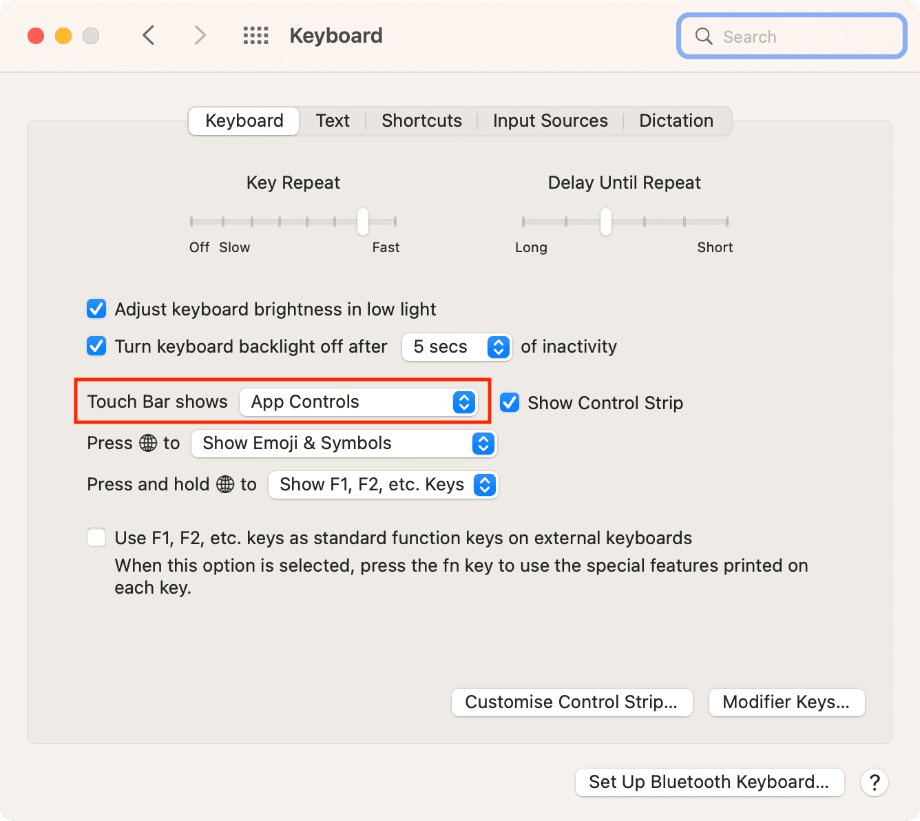 Touch Bar shows settings in Mac System Preferences to get back the missing emoji key