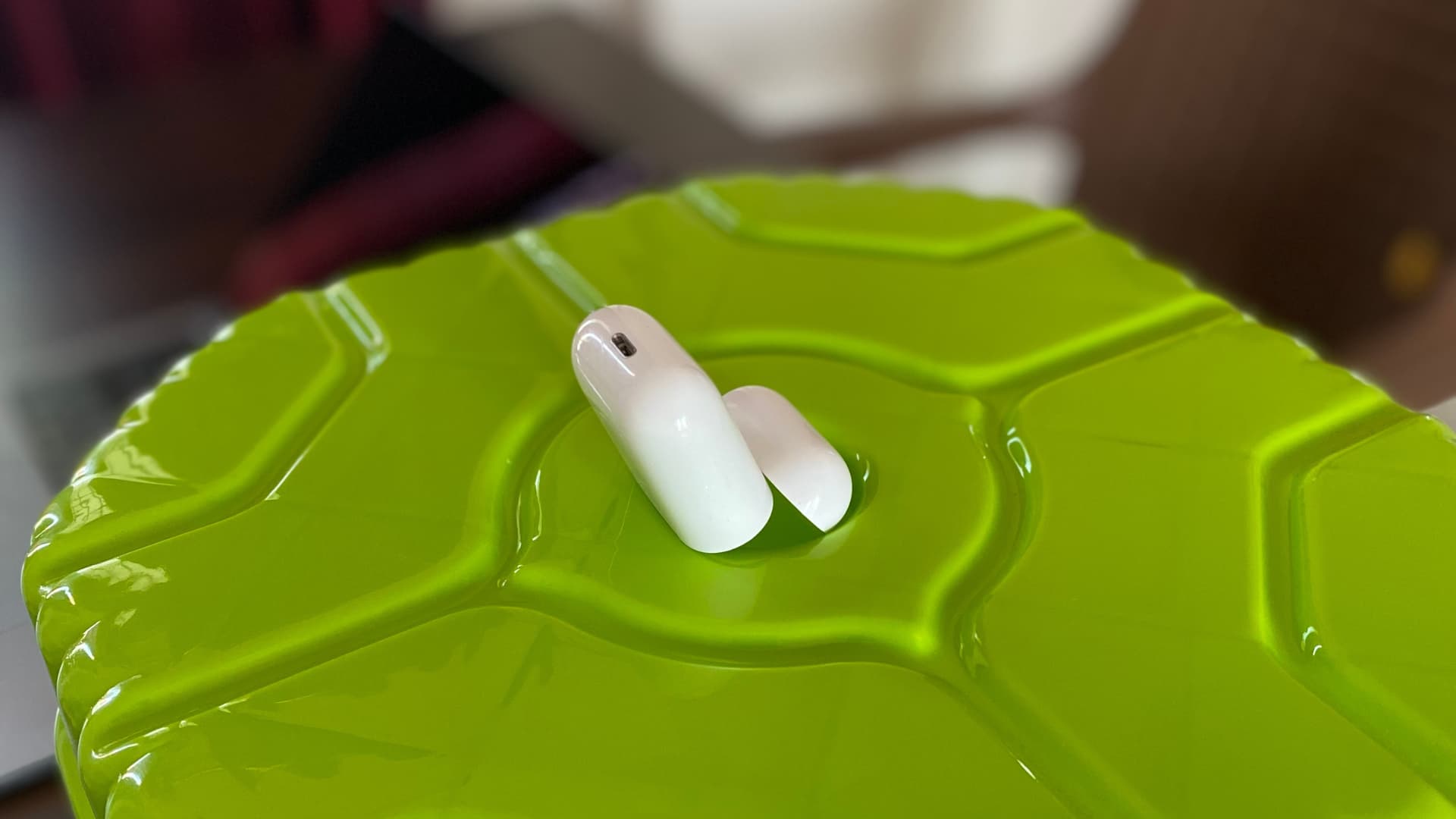 AirPods Charging Case kept upside down to remove water that may have gone inside