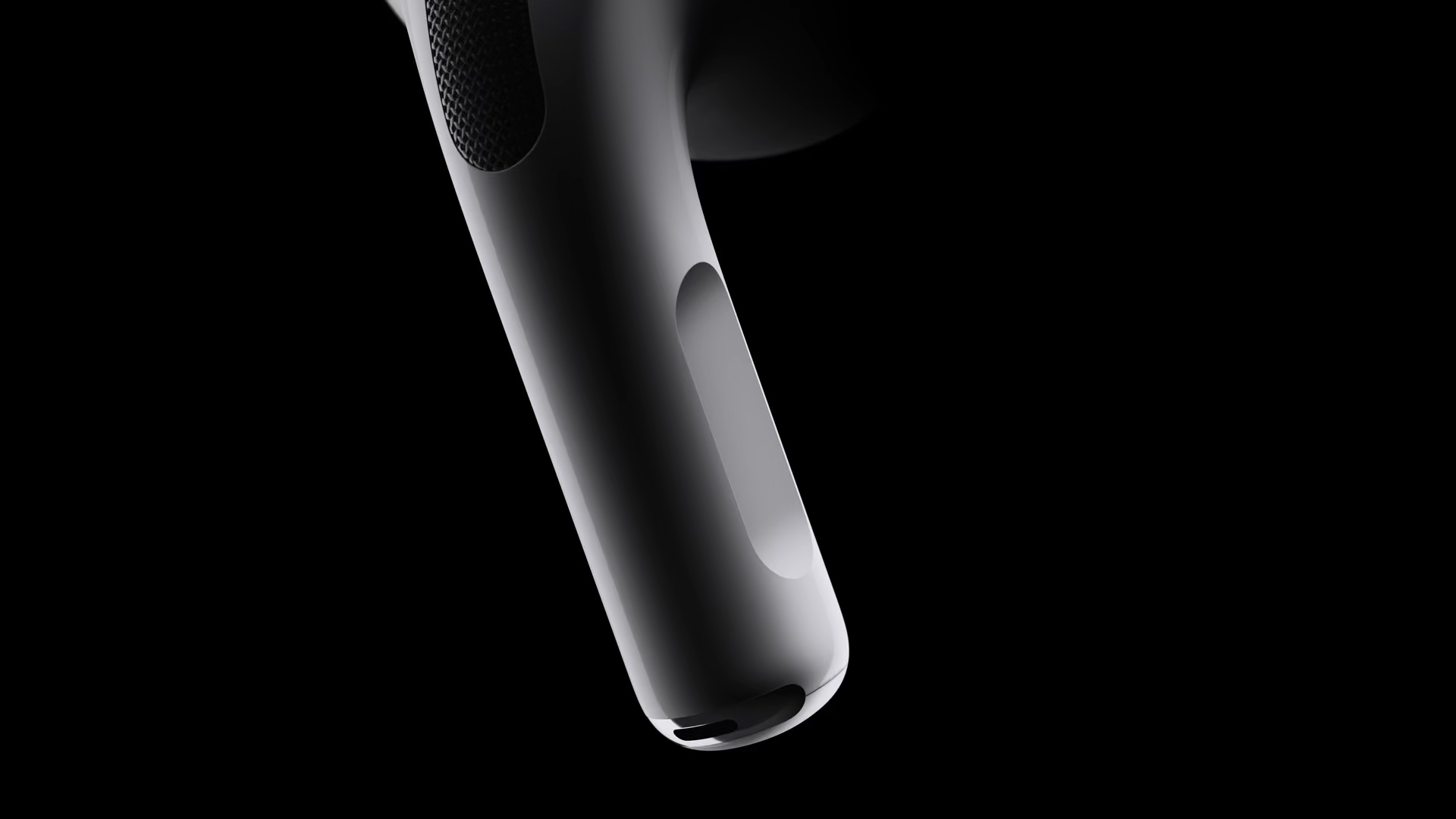 Closeup of an AirPod stem with a touch surface for adjusting the volume