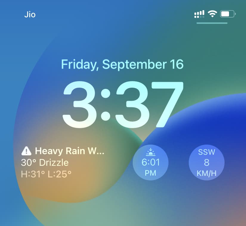 Three weather widgets on iPhone Lock Screen