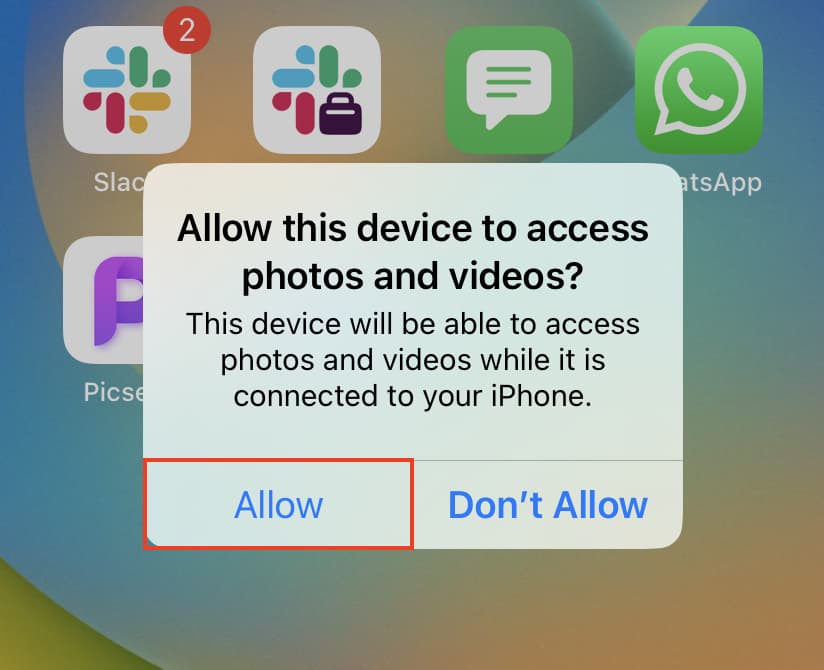 Allow this device to access photos and videos alert on iPhone