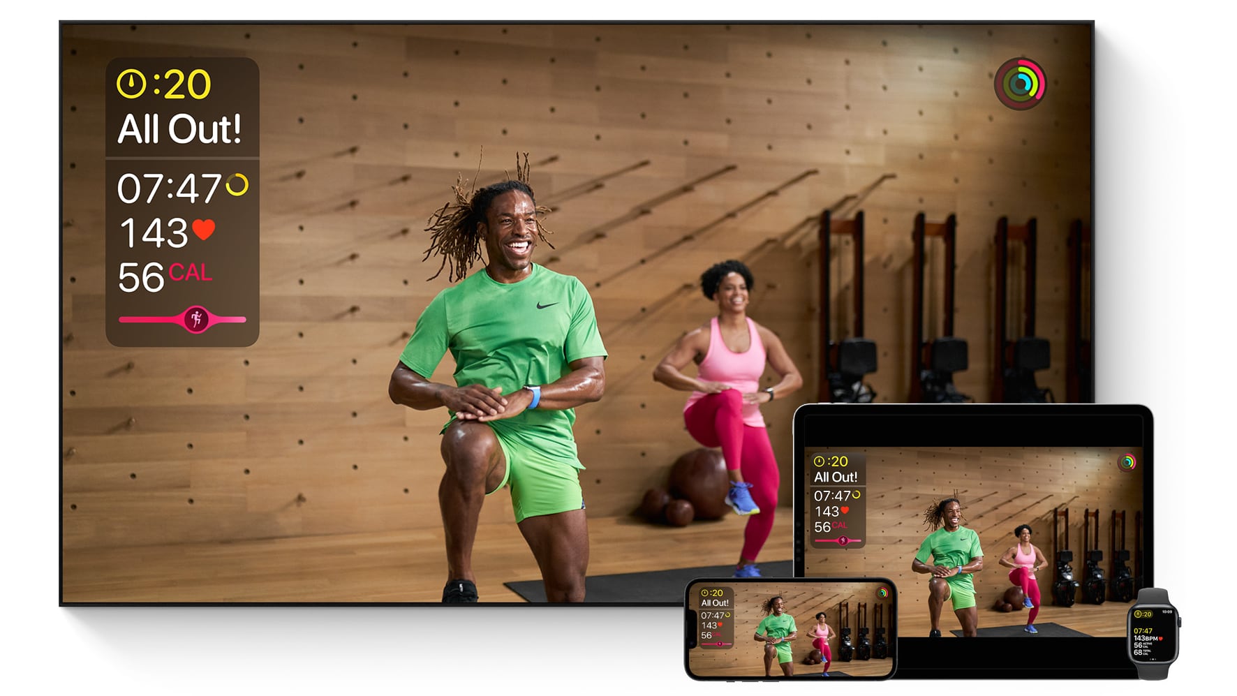 Apple TV, iPhone, iPad and Apple Watch showcasing a HIIT workout from Fitness+ with real-time metrics