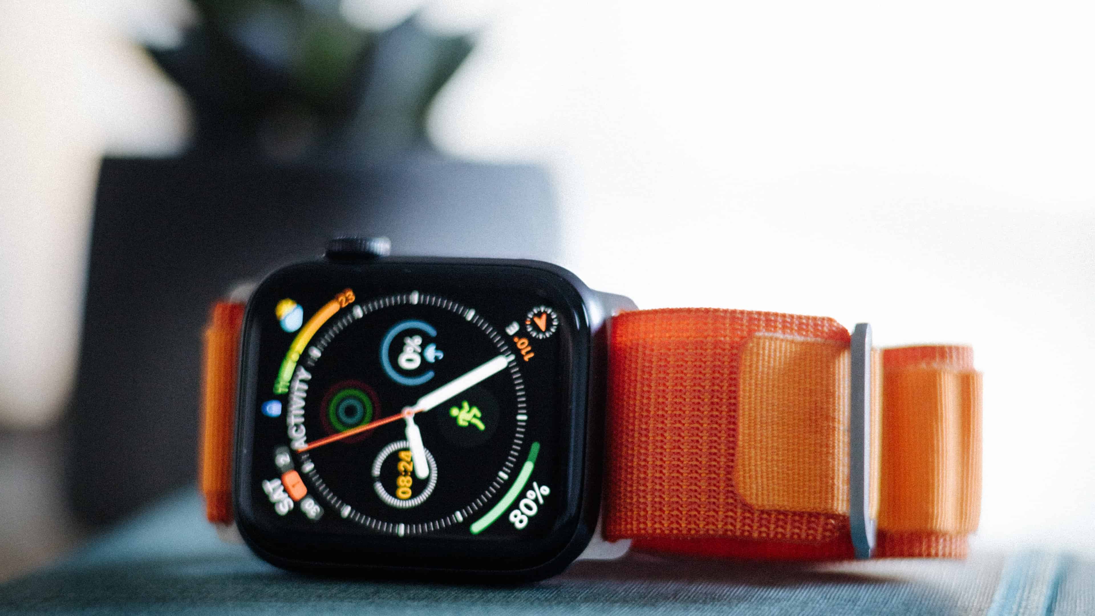 Apple Watch Ultra laid on a table on its side