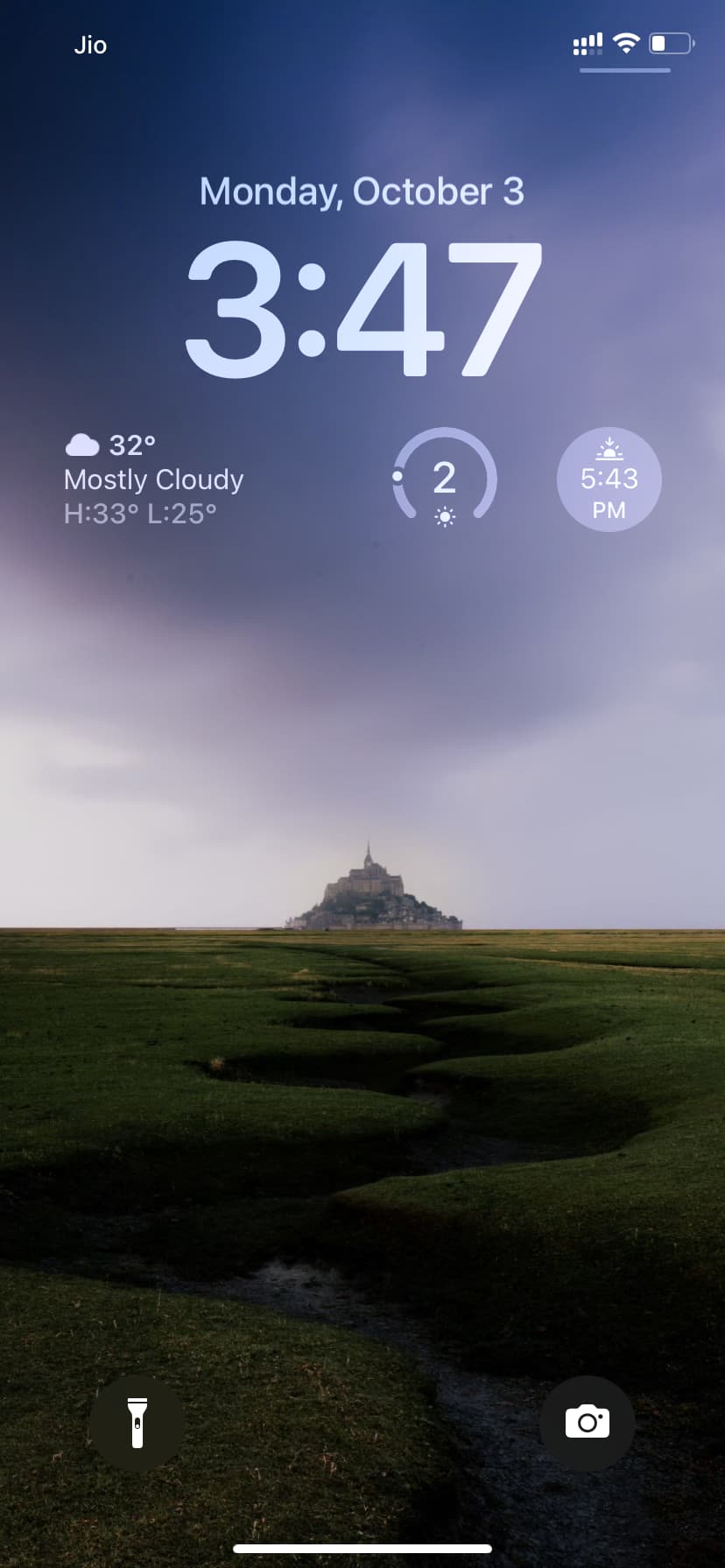 iPhone Lock Screen showing weather conditions
