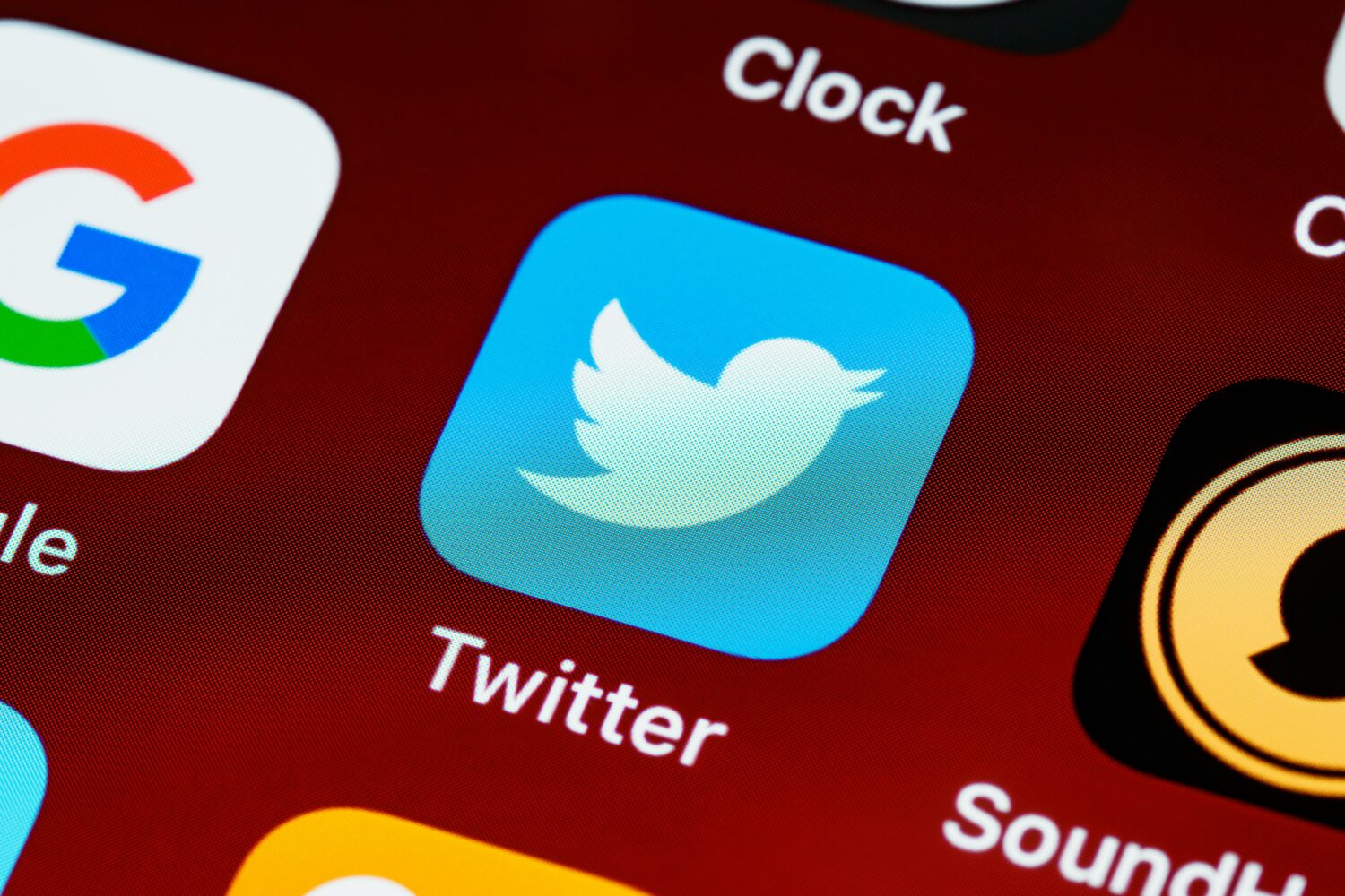 Closeup of the Twitter app icon on an iPhone home screen