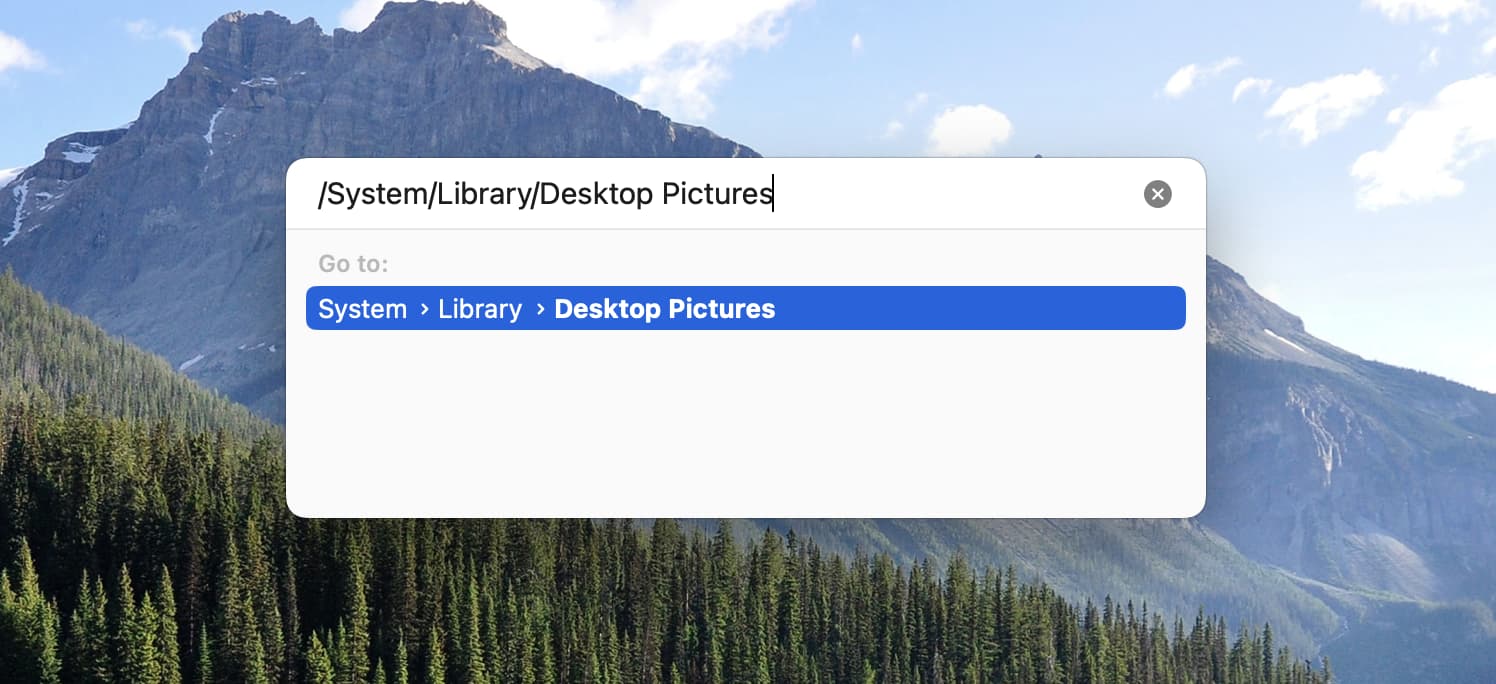 Go to Desktop Pictures folder on Mac